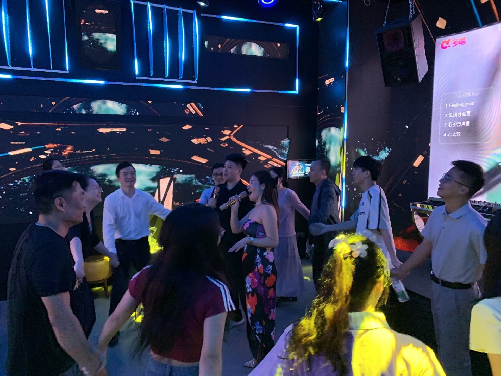 T.I Group's Singing Celebration:Audio, Lighting & LED Transform Corporate Fun into Sensory Spectacle